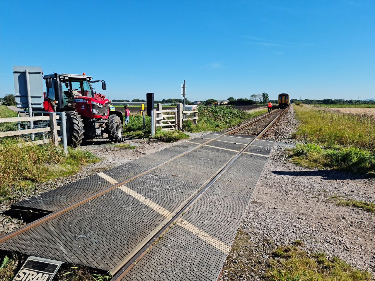Tractor collides with train carrying 40 people in Lancashire