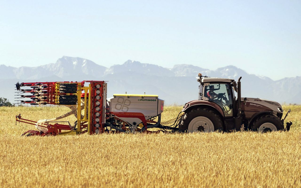 Moving the hopper forward allows room for the power harrow to fold up