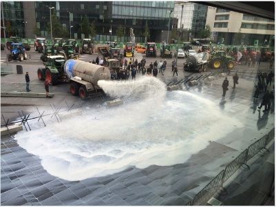 Tankers spray 40,000L of milk over EU buildings in Luxembourg in protest