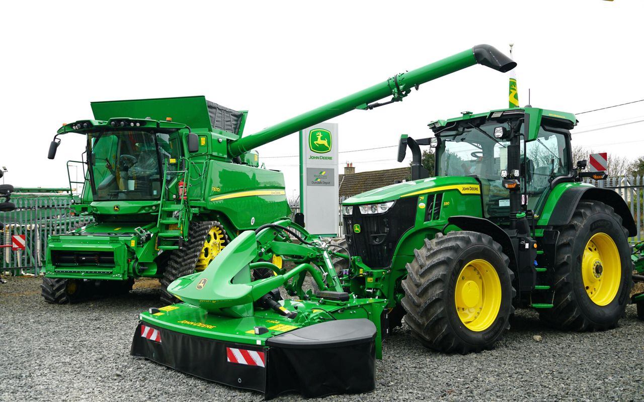 John Deere cuts production and jobs as sales fall