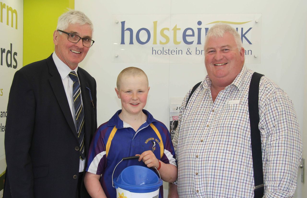 14-year-old raises £1,800 after shaving head for ‘proud papa’