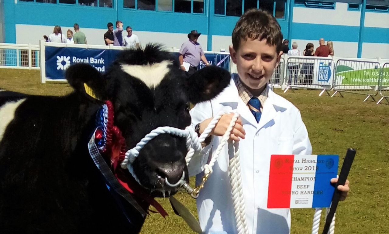 Young Limousin breeder manages major show hat-trick