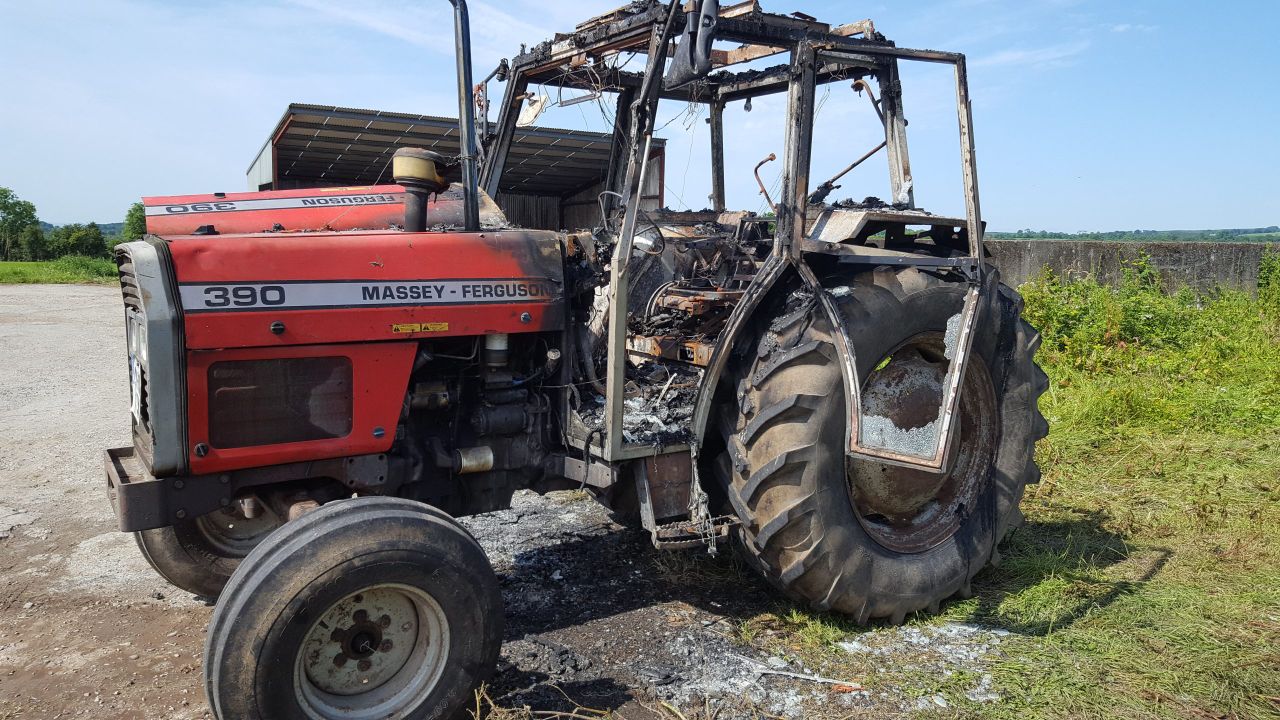 Pics: Tractor engulfed in flames while drawing in bales