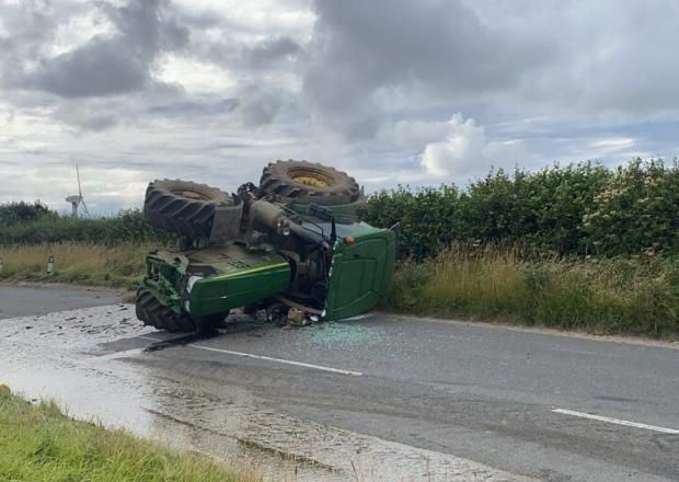 Tractor and slurry tanker overturns in Cornwall road accident