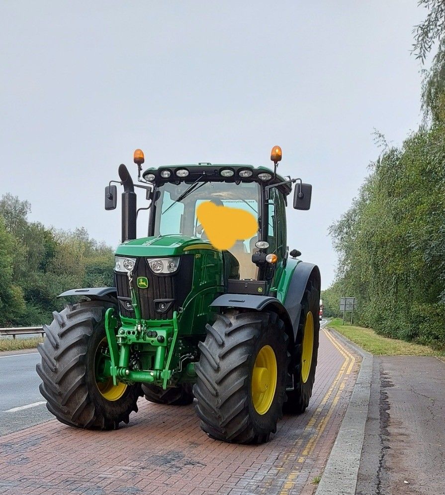 Tractor driver stopped for using mobile phone while driving