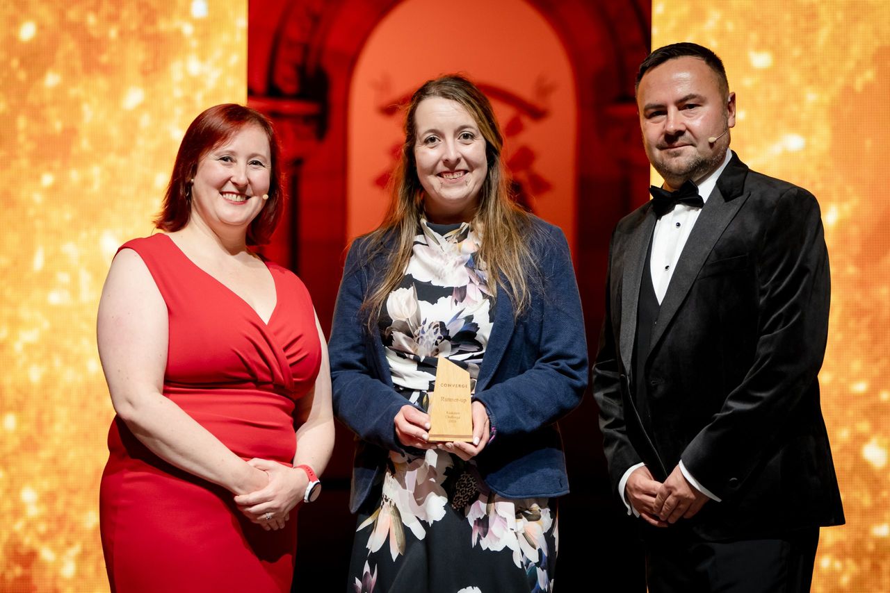 Michaela Thorn, AI for the EYE (centre) being presented with her runner-up award in the Kickstart Challenge at the Converge Awards