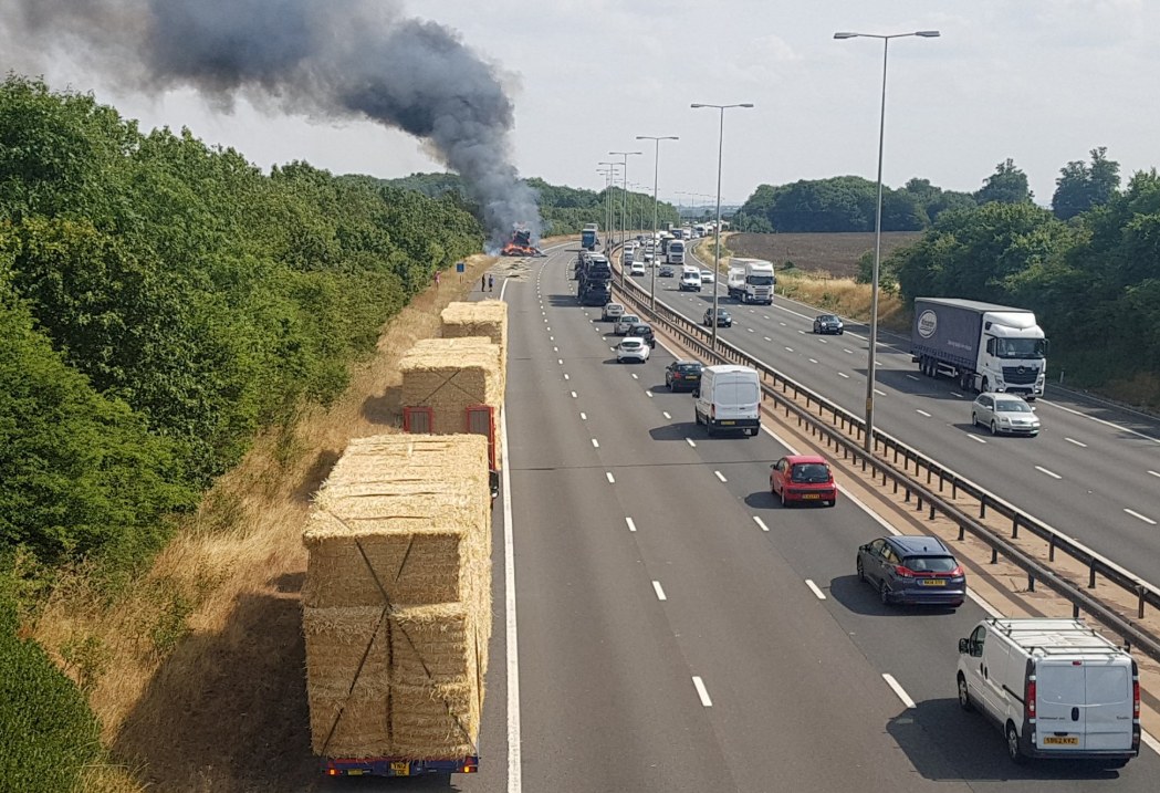Lorry transporting bales goes up in smoke on UK motorway