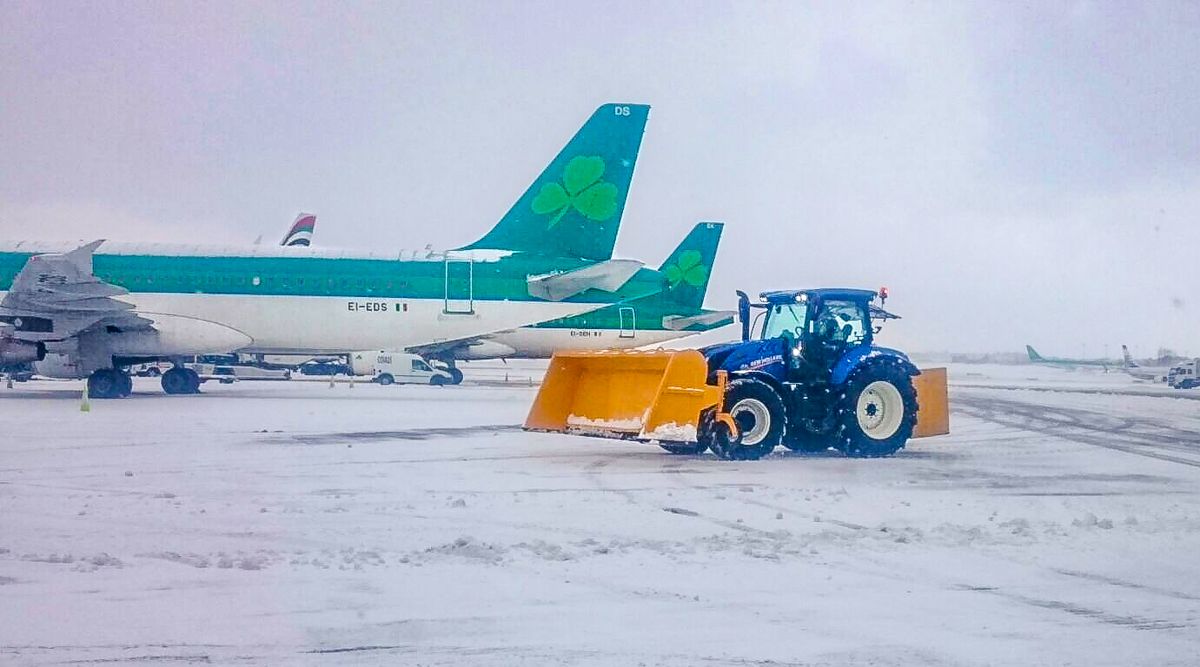 41 New Holland tractors battle today's snow...at Dublin Airport