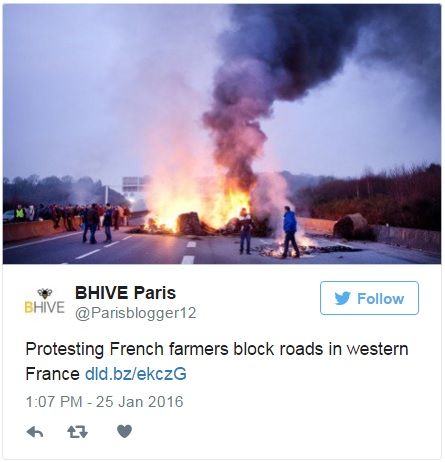 Pics: Protesting French farmers set tyres on fire and block roads with tractors