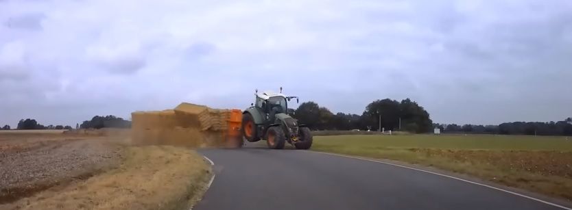 Video: How not to go around a corner with a trailer of bales