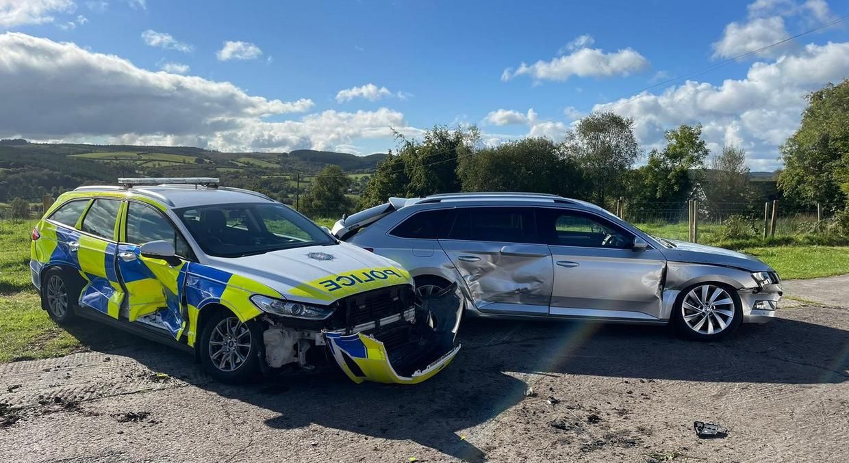 Tractor driver arrested for attempted murder after ramming 3 police cars