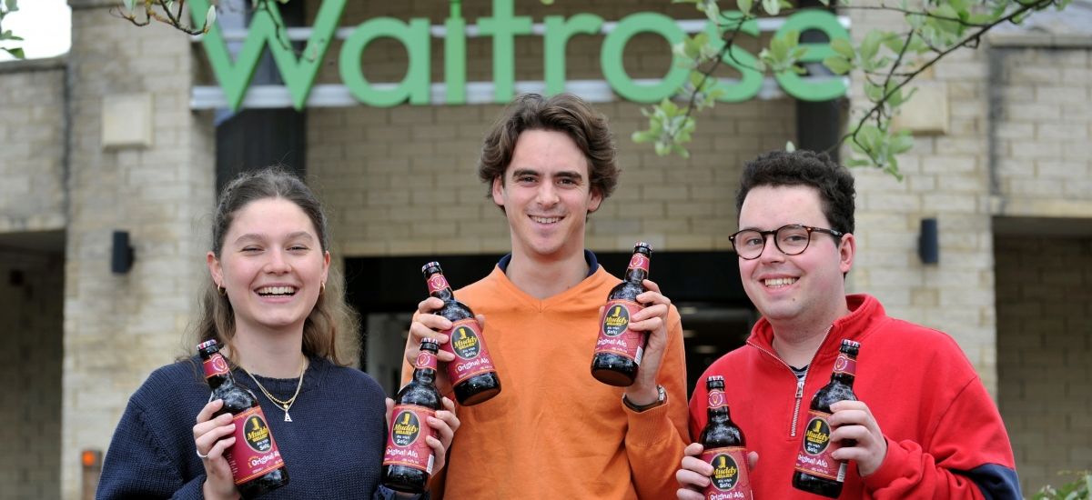 Ag university students raise a glass as their beer hits supermarket shelves