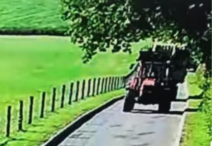 Video: Bale trailer breaks loose from towing tractor