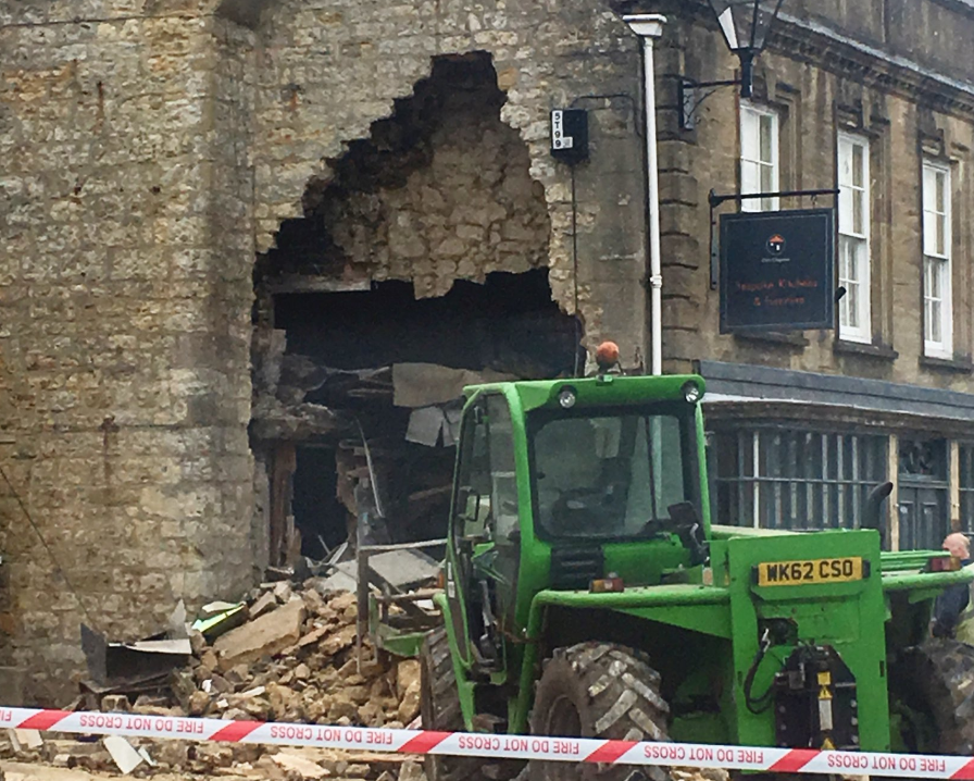 ATM ripped from shop wall using stolen telehandler