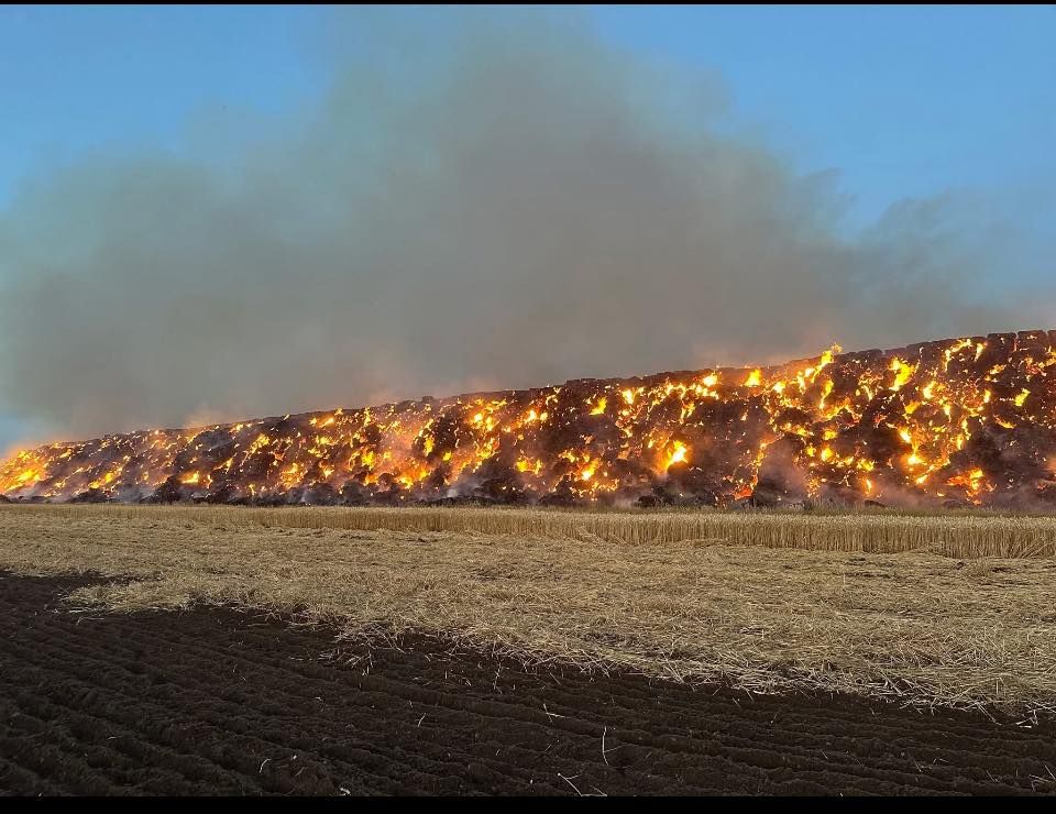 12,000t of straw bales erupt into flames at former RAF base