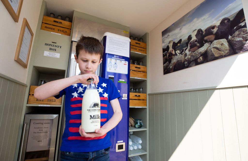 Eight-year-old Caelan McCreadie from Askrigg buys himself a litre of milk