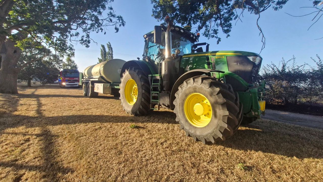 Pics: Farmers mobilise to help crews halt massive grass fire