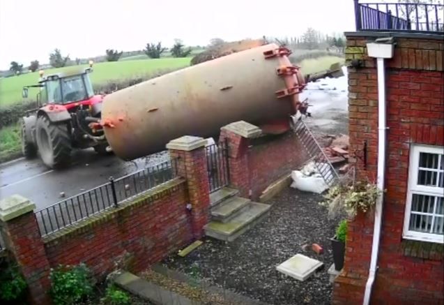 Video: Dramatic footage of slurry tank crashing through a garden wall