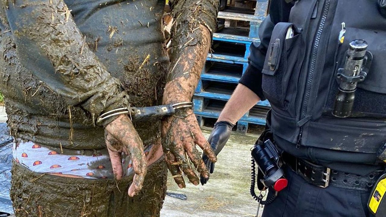 Man arrested after falling ‘neck-deep’ into slurry pit after police chase
